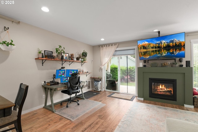 6910 SE Lamphier St, Milwaukie, OR 97222 - office area with wood finished floors, recessed lighting, a glass covered fireplace, and baseboards