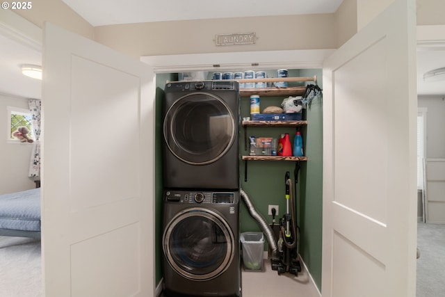6910 SE Lamphier St, Milwaukie, OR 97222 - washroom featuring estacked washer and dryer, carpet, and baseboards