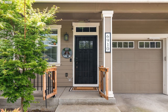 6910 SE Lamphier St, Milwaukie, OR 97222 - entrance to property with a porch and a garage