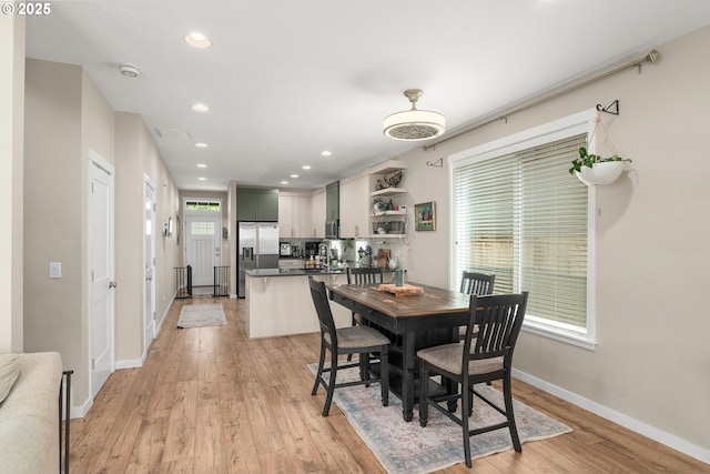 6910 SE Lamphier St, Milwaukie, OR 97222 - dining space with light wood-style flooring, baseboards, and recessed lighting