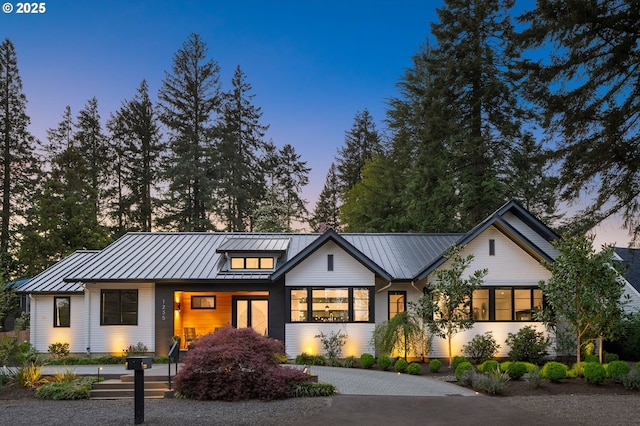 1235 Andrews Rd, Lake Oswego, OR 97034 - modern farmhouse featuring a standing seam roof, a metal roof, a porch, and driveway