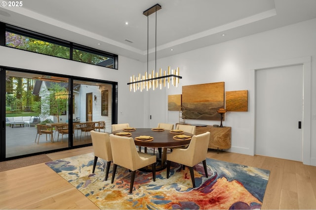 1235 Andrews Rd, Lake Oswego, OR 97034 - dining room with wood finished floors, a towering ceiling, a raised ceiling, and recessed lighting