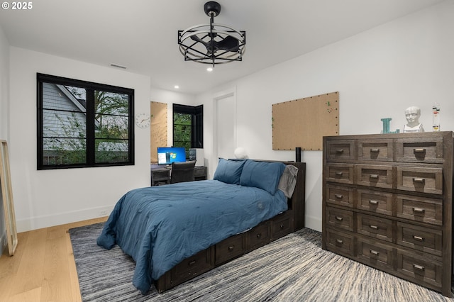 1235 Andrews Rd, Lake Oswego, OR 97034 - bedroom featuring recessed lighting, wood finished floors, and a chandelier