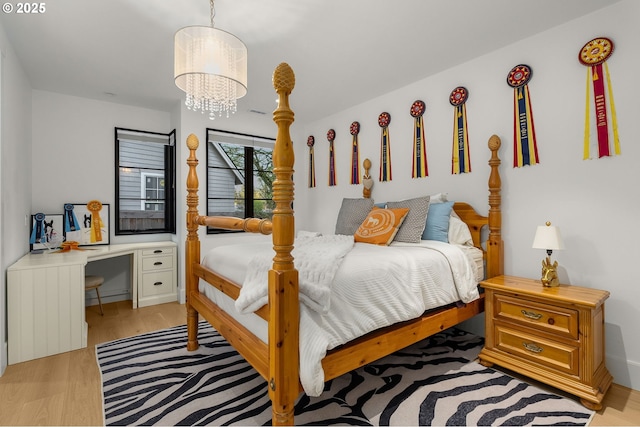 1235 Andrews Rd, Lake Oswego, OR 97034 - bedroom featuring a chandelier, light wood-style flooring, and a desk