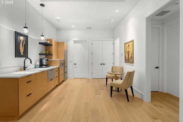 1235 Andrews Rd, Lake Oswego, OR 97034 - kitchen with modern cabinets, light wood-type flooring, open shelves, light countertops, and stainless steel dishwasher