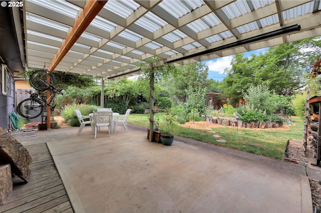 2940 Pearl St, Eugene, OR 97405 - fenced backyard with outdoor dining area, a patio area, and a pergola