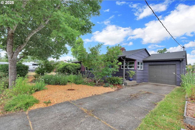 2940 Pearl St, Eugene, OR 97405 - view of front of property featuring a garage and driveway