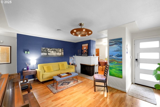 2940 Pearl St, Eugene, OR 97405 - living room with wood finished floors and a brick fireplace