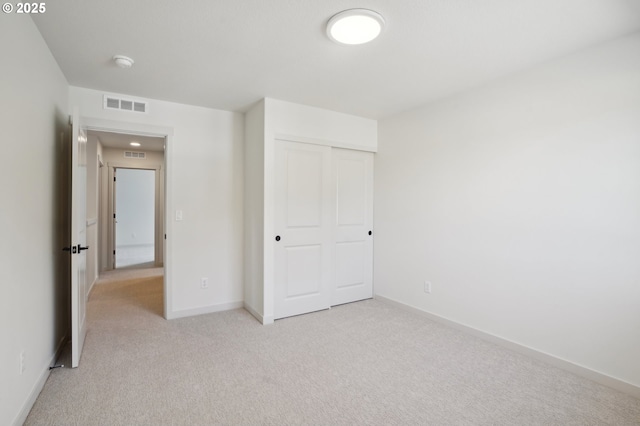 17109 NE 82nd St, Vancouver, WA 98682 - unfurnished bedroom with a closet, baseboards, light colored carpet, and visible vents