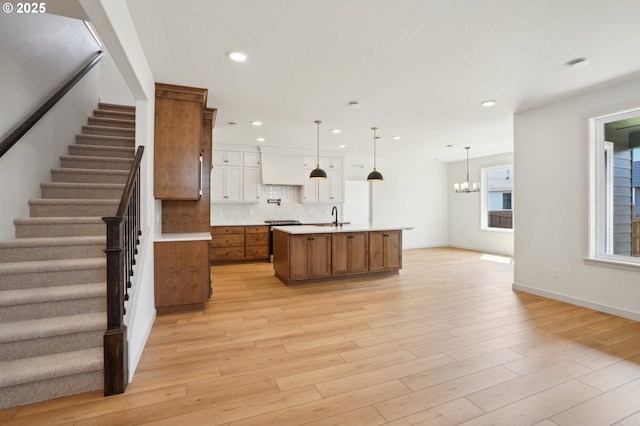 17109 NE 82nd St, Vancouver, WA 98682 - kitchen with brown cabinets, recessed lighting, decorative backsplash, and light countertops