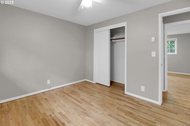 29652 Lusk Rd, Eugene, OR 97405 - unfurnished bedroom with wood finished floors, baseboards, and a closet