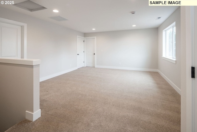 4654 NW 71st Ave, Camas, WA 98607 - empty room featuring light carpet, recessed lighting, and baseboards