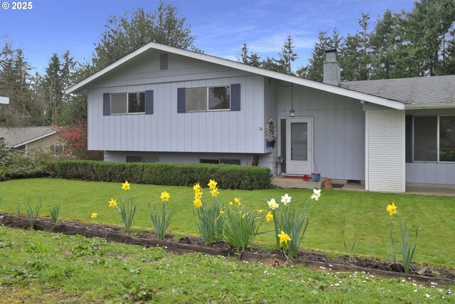 85304 Nestle Way, Pleasant Hill, OR 97455 - tri-level home featuring a chimney and a front yard