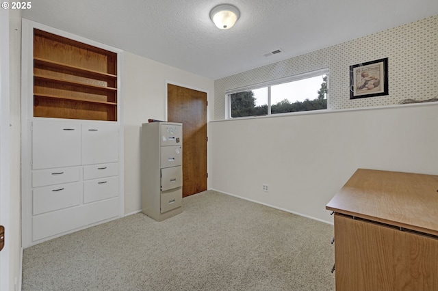 85304 Nestle Way, Pleasant Hill, OR 97455 - unfurnished bedroom featuring light colored carpet, a textured ceiling, and baseboards