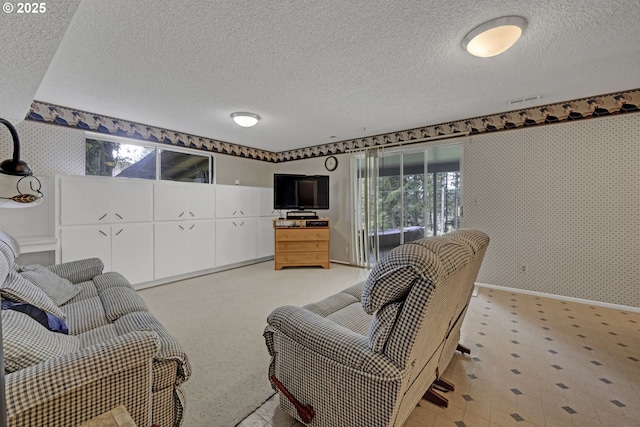 85304 Nestle Way, Pleasant Hill, OR 97455 - living room with a textured ceiling, wallpapered walls, baseboards, and light flooring