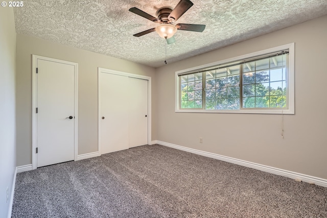 16127 NE Caples Rd, Brush Prairie, WA 98606 - unfurnished bedroom featuring a textured ceiling, carpet floors, and ceiling fan
