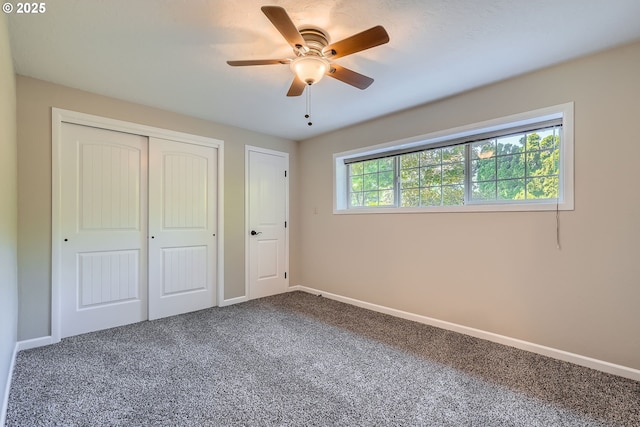 16127 NE Caples Rd, Brush Prairie, WA 98606 - unfurnished bedroom featuring carpet flooring, a closet, and a ceiling fan