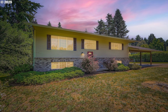 16127 NE Caples Rd, Brush Prairie, WA 98606 - raised ranch with brick siding, a front yard, and an attached carport