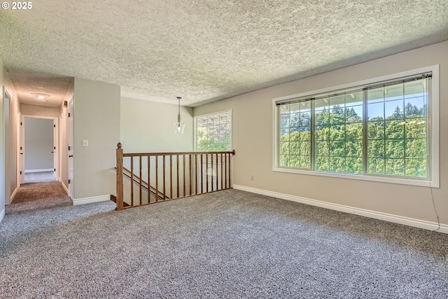 16127 NE Caples Rd, Brush Prairie, WA 98606 - carpeted spare room with a textured ceiling