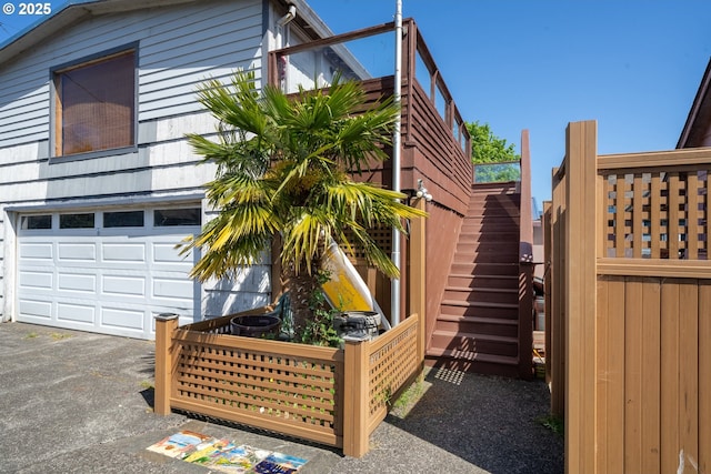 520 Elm Ave, Tillamook, OR 97141 - view of side of property featuring stairs and a garage