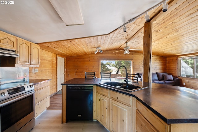 520 Elm Ave, Tillamook, OR 97141 - kitchen with dishwasher, stainless steel electric range oven, a sink, wooden walls, and light brown cabinetry