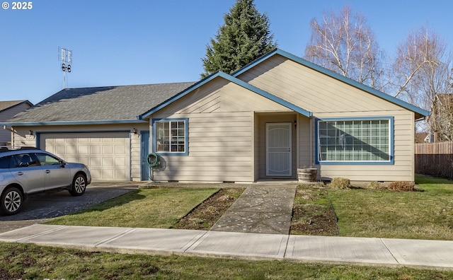 single story home featuring a garage and a front yard