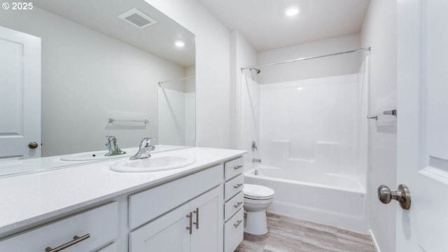 247 Stella St, Salem, OR 97301 - full bath with vanity, wood finished floors, tub / shower combination, and recessed lighting