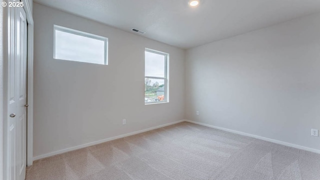 247 Stella St, Salem, OR 97301 - unfurnished room featuring carpet floors and plenty of natural light