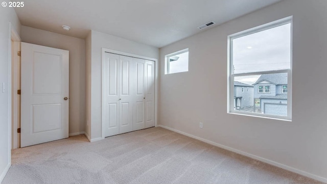 247 Stella St, Salem, OR 97301 - unfurnished bedroom with carpet floors and a closet