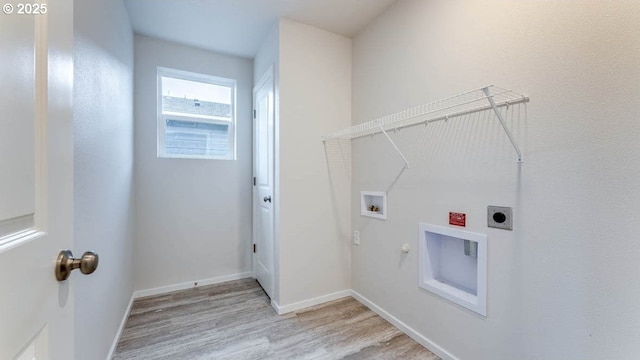 247 Stella St, Salem, OR 97301 - laundry room with hookup for an electric dryer, light wood finished floors, washer hookup, and hookup for a gas dryer