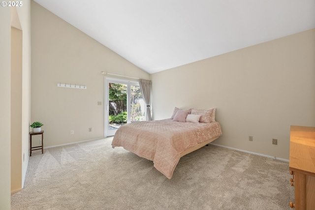 bedroom with access to exterior, light colored carpet, baseboards, and high vaulted ceiling
