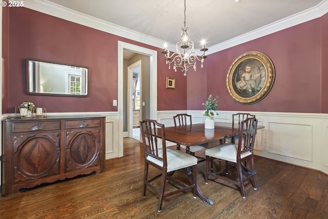 24800 SW Big Fir Rd, West Linn, OR 97068 - dining room with a chandelier, wood finished floors, crown molding, and a wainscoted wall