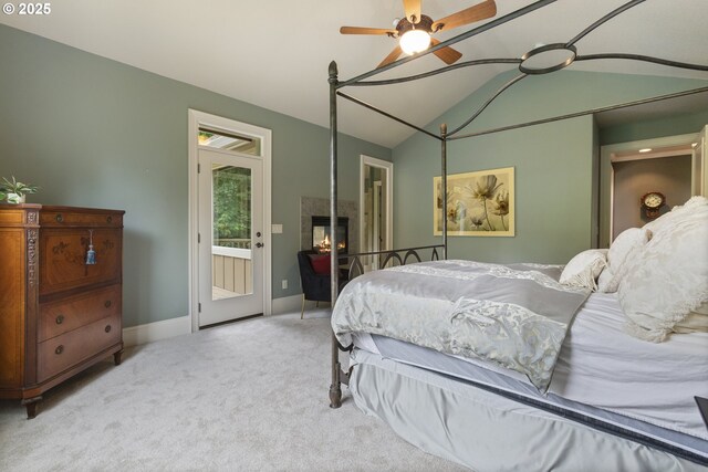 24800 SW Big Fir Rd, West Linn, OR 97068 - bedroom featuring carpet, a lit fireplace, vaulted ceiling, baseboards, and a ceiling fan