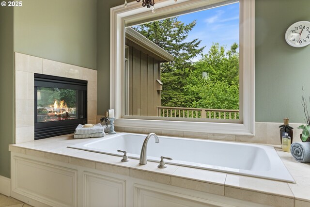 24800 SW Big Fir Rd, West Linn, OR 97068 - bathroom featuring a garden tub and a tiled fireplace