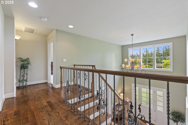 24800 SW Big Fir Rd, West Linn, OR 97068 - hallway featuring a chandelier, an upstairs landing, wood finished floors, baseboards, and recessed lighting