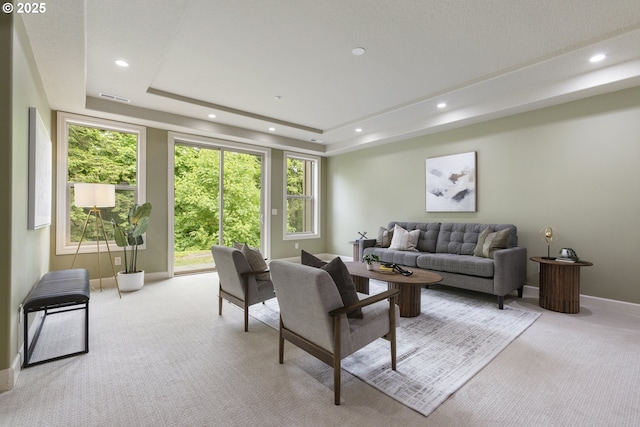 24800 SW Big Fir Rd, West Linn, OR 97068 - living area featuring carpet floors, a tray ceiling, recessed lighting, and baseboards