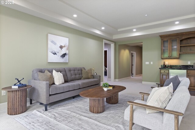 24800 SW Big Fir Rd, West Linn, OR 97068 - living area with bar with sink, recessed lighting, light carpet, and baseboards