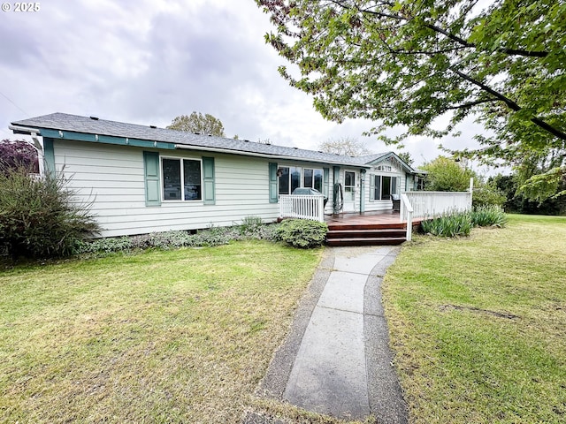 ranch-style house with a deck, crawl space, and a front lawn