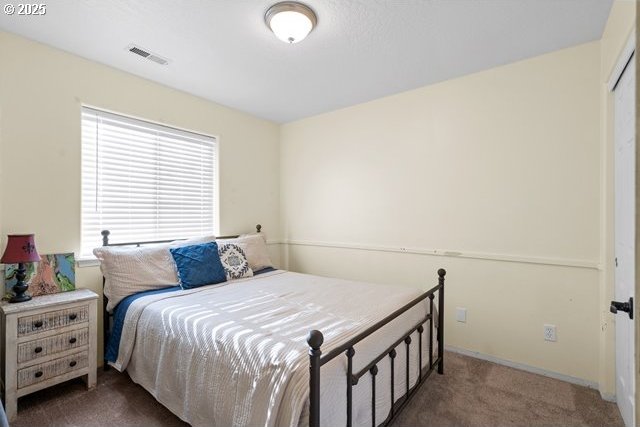 bedroom featuring carpet floors