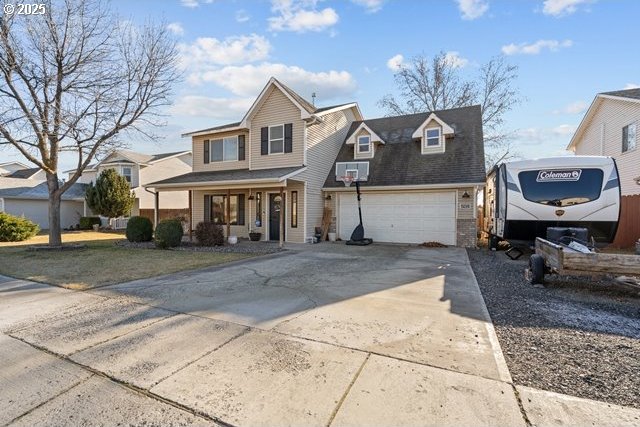 view of property featuring covered porch