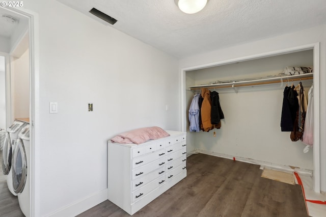 interior space with washing machine and clothes dryer