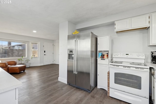 kitchen featuring dark wood-type flooring, white electric stove, stainless steel fridge with ice dispenser, and white cabinets