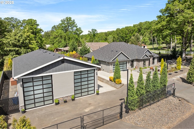22961 SE Filbert Rd, Eagle Creek, OR 97022 - view of front facade with an outdoor structure, a gate, and a shingled roof