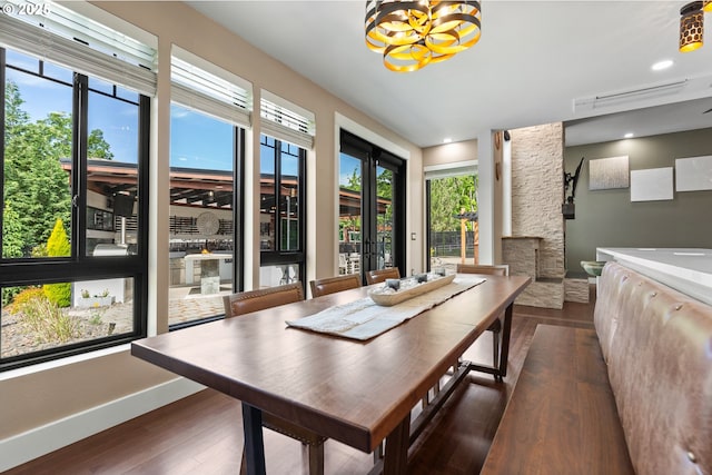 22961 SE Filbert Rd, Eagle Creek, OR 97022 - dining room with dark wood-style flooring, baseboards, and a chandelier
