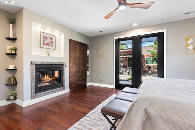 22961 SE Filbert Rd, Eagle Creek, OR 97022 - bedroom with access to outside, wood finished floors, baseboards, a glass covered fireplace, and recessed lighting