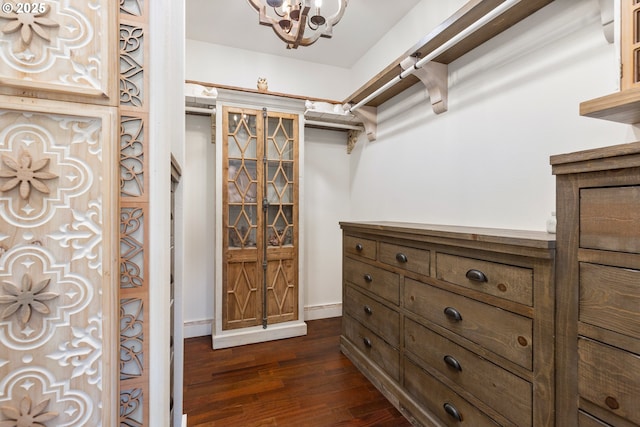 22961 SE Filbert Rd, Eagle Creek, OR 97022 - spacious closet featuring dark wood-type flooring and a chandelier