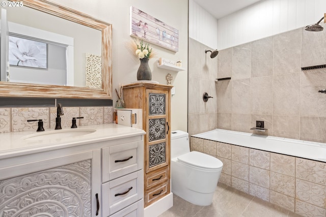22961 SE Filbert Rd, Eagle Creek, OR 97022 - bathroom with toilet, vanity, tile patterned floors, tiled shower / bath combo, and backsplash