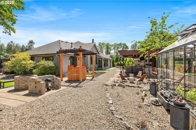 22961 SE Filbert Rd, Eagle Creek, OR 97022 - view of side of property with a pergola, a patio, area for grilling, and an outdoor fire pit