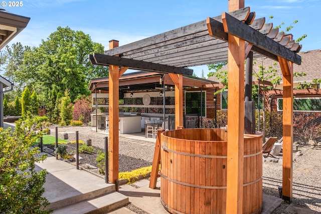 22961 SE Filbert Rd, Eagle Creek, OR 97022 - view of patio / terrace with a pergola and an outdoor kitchen