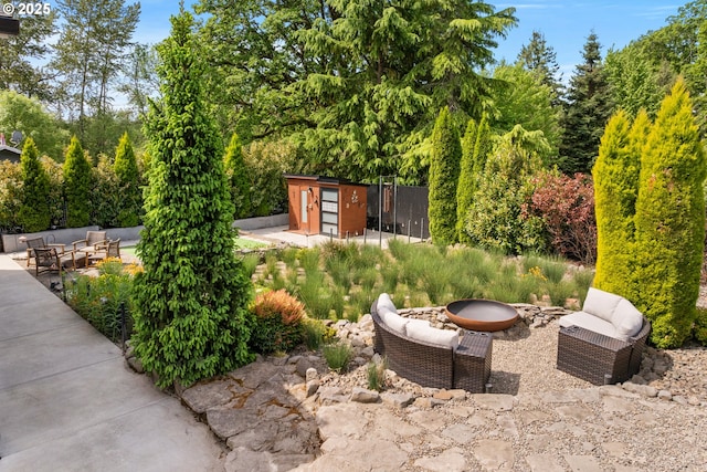 22961 SE Filbert Rd, Eagle Creek, OR 97022 - view of patio with an outdoor living space with a fire pit